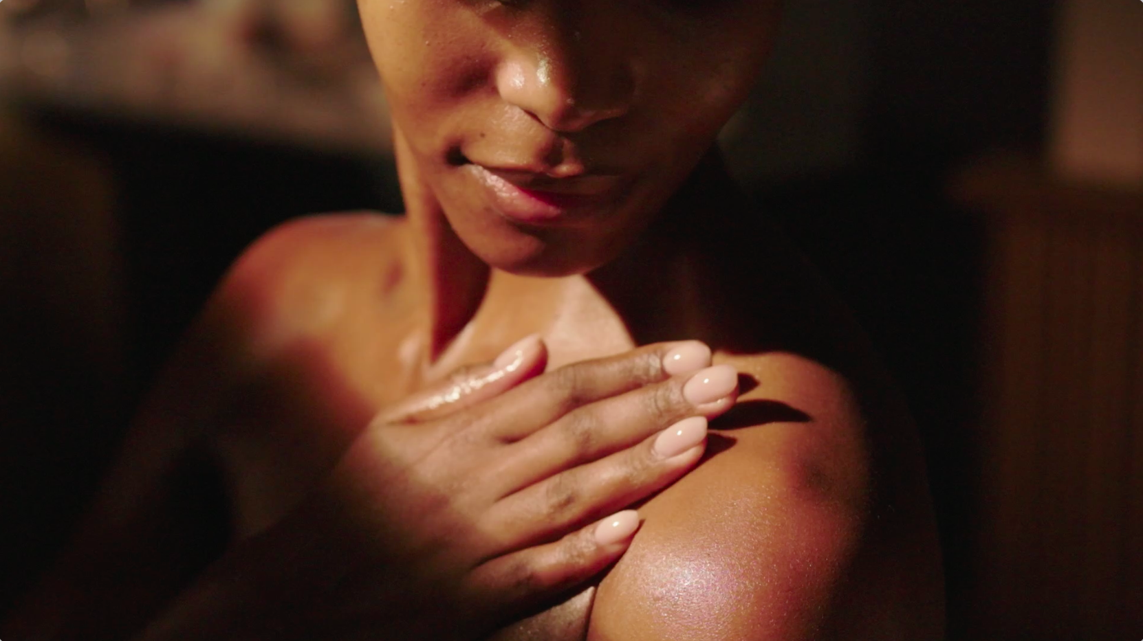 Woman applying skincare